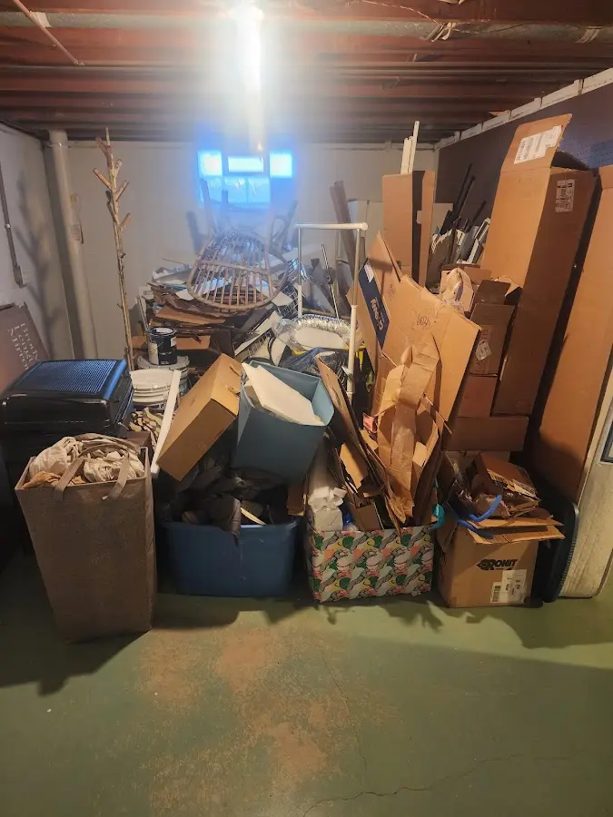 Roll-off dumpster container at job site for Yard Waste Dumpster Rental in Des Moines